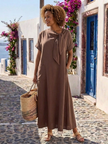 FJØRNA summer midi dress for women with short sleeves, pockets, and a flowy design, perfect for warm weather.