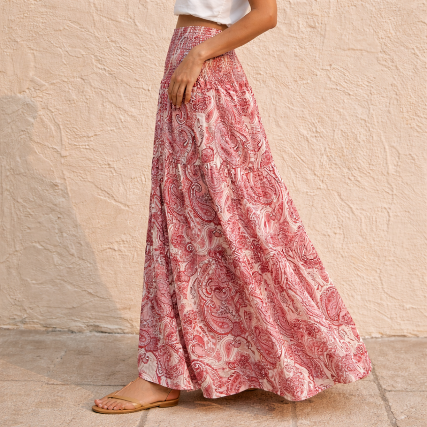 FJØRNA pink paisley shirred high-waist boho maxi skirt with white floral pattern, flowing and stylish for women.