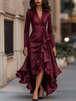 Navy blue draped satin maxi dress by FJØRNA with ruffle details and flowing silhouette, perfect for elegant occasions.
