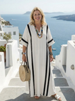 FJØRNA women's summer maxi dress with striped pattern, short sleeves, wrap design, flowy fabric for a stylish, comfortable look.