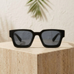 FJØRNA vintage 90s rectangular unisex sunglasses with dark tinted lenses and black frames, accessory for women.