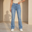 Women's high waist slim fit bootcut jeans by FJØRNA, made of cotton denim, shown in a natural pose highlighting the fit and fabric.