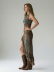 Flowy summer midi dress for women by FJØRNA featuring an asymmetric hem and lightweight fabric.