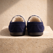 FJØRNA men's suede wool-lined slippers with cozy interior, featuring soft suede exterior and slip-on design for winter comfort.