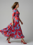 FJØRNA women's floral summer maxi dress with V-neck and wrap design, flowing lightweight fabric perfect for warm weather.