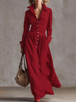 FJØRNA high waisted maxi dress with long sleeves, button details, pleated pockets, solid color, split-joint lapel design.