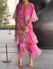 Red chiffon midi dress for women with v-neckline, ruffle detail, and printed design by FJØRNA.