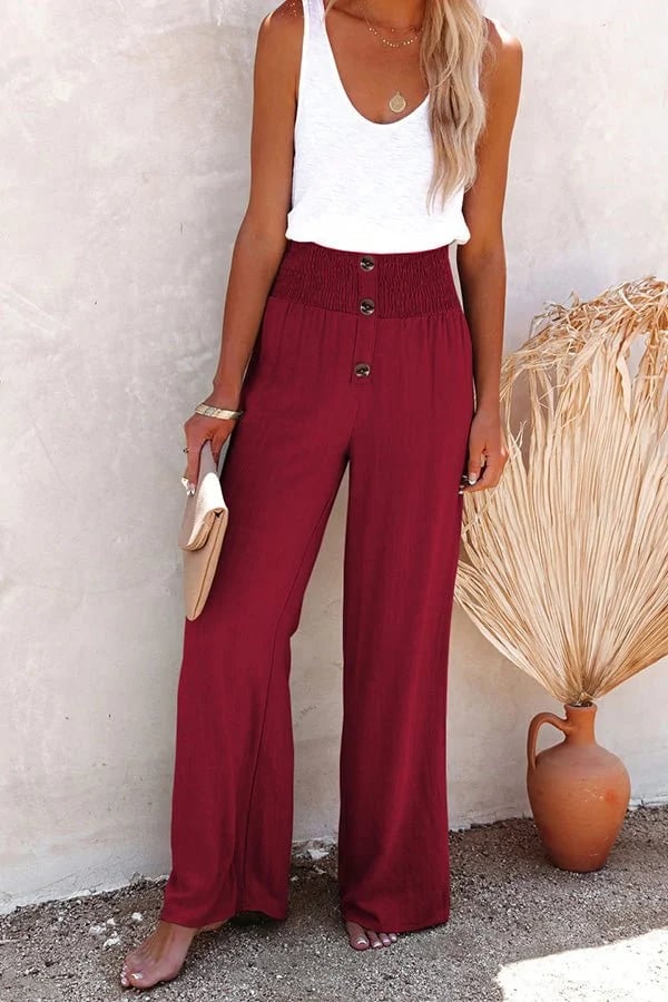 FJØRNA lightweight summer women's trousers with high waist and smocked design, shown in a relaxed fit with a soft fabric.