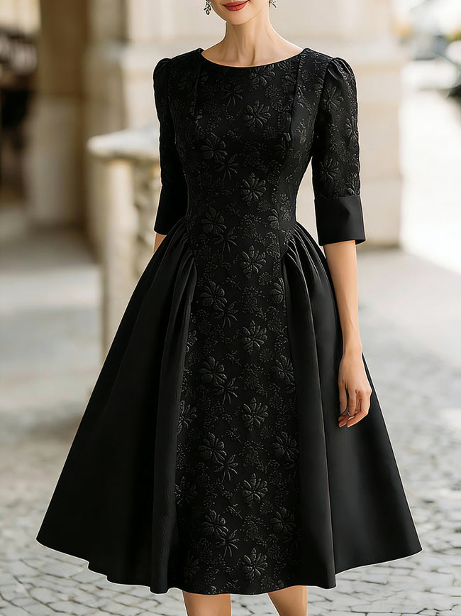 FJØRNA elegant jacquard short-sleeve A-line midi dress for women, showcasing a stylish design with intricate fabric pattern.