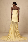 FJØRNA yellow off-shoulder sheer tulle maxi dress for women, elegant evening dress with flowing fabric and black tie detail.