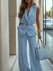 Light blue sleeveless two-piece trouser set with patch pockets for women, stylish FJØRNA pants ensemble, casual and chic.