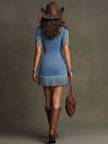 Blue faux suede tassel mini dress by FJØRNA, featuring a casual style with tassel details and a fitted silhouette.