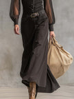 Black denim V-neck maxi dress by FJØRNA, casual style with flowing length and sleeveless design, suitable for everyday wear.