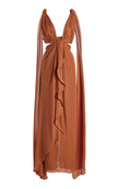 FJØRNA Ocean Mysteries draped maxi dress with flowing fabric and ocean-inspired patterns on a model.