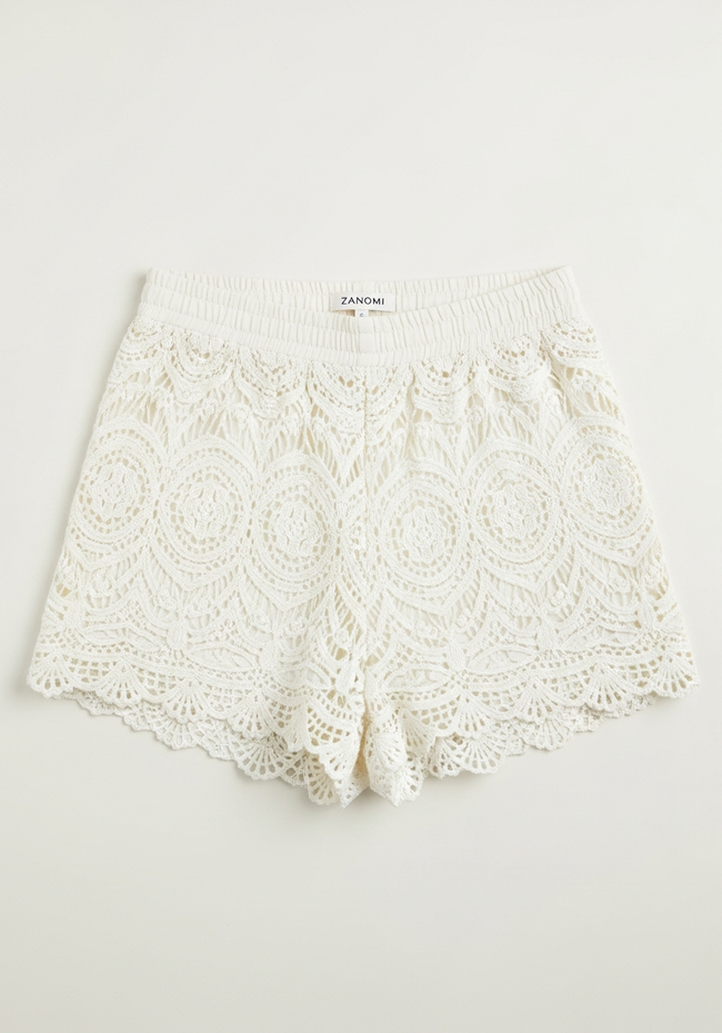 Women's boho beach shorts with elastic waistband by FJØRNA, featuring lightweight fabric and relaxed fit for summer beachwear.