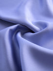 Lavender satin cross-neck sleeveless blouse for women by FJØRNA, showing the elegant front view with stylish cross detail.