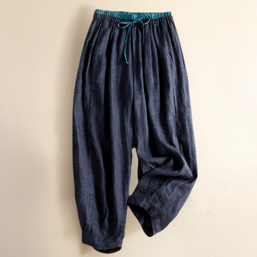 FJØRNA women's linen tapered trousers, stylish and comfortable pants with a relaxed fit, perfect for casual and smart outfits.