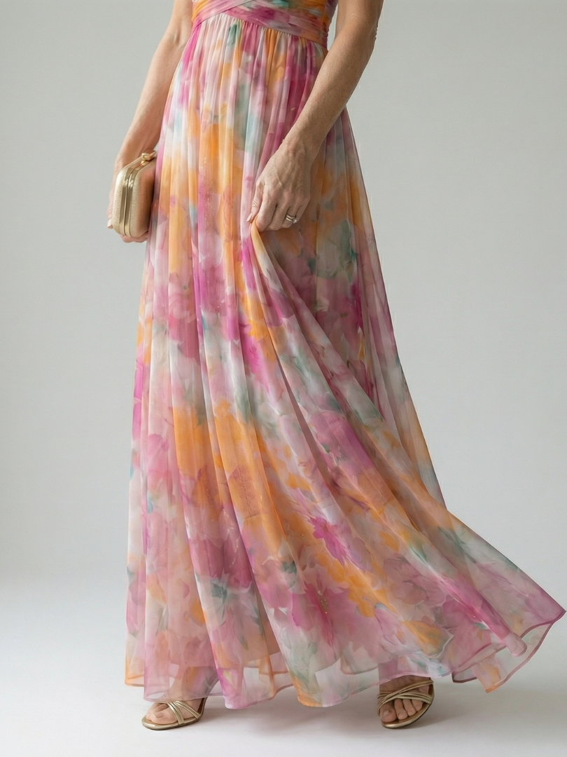FJØRNA women's sleeveless summer maxi dress with wrap design, flowy fabric and vibrant pattern for warm weather wear