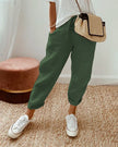 FJØRNA women's lightweight summer trousers with straight leg and high waist, shown in a neutral color on a model.