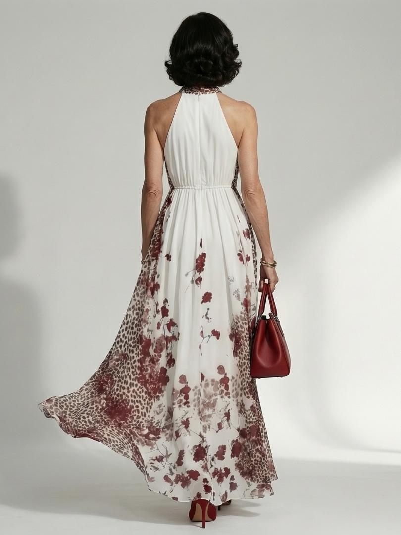 FJØRNA floral summer maxi dress for women with long sleeves and pleated design, flowing and lightweight for warm weather.