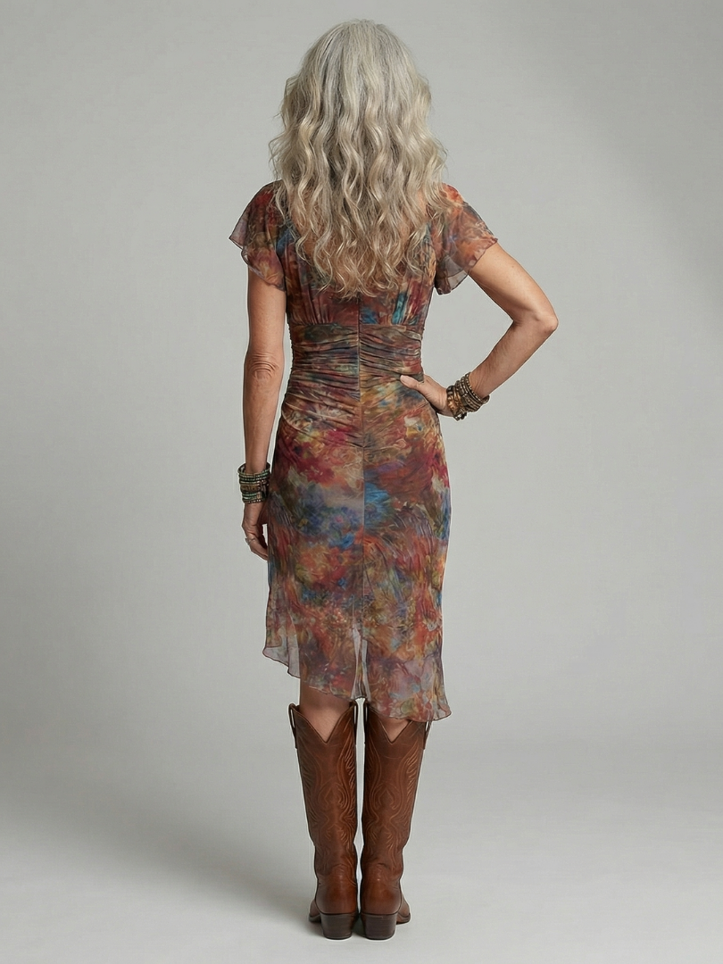 FJØRNA women's summer midi dress with short sleeves and ruched design, perfect for casual warm-weather wear.