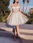 Pink tulle cocktail dress for women by FJØRNA, featuring a fitted bodice and flowing skirt for elegant occasions.