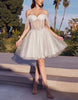 Pink tulle cocktail dress for women by FJØRNA, featuring a fitted bodice and flowing skirt for elegant occasions.