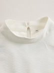 Cream textured lantern sleeve two-piece set for women by FJØRNA, featuring stylish pants and matching top.