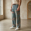 FJØRNA unisex rose print wide-leg floral denim jeans, men's pants with vibrant rose pattern, relaxed fit and stylish design