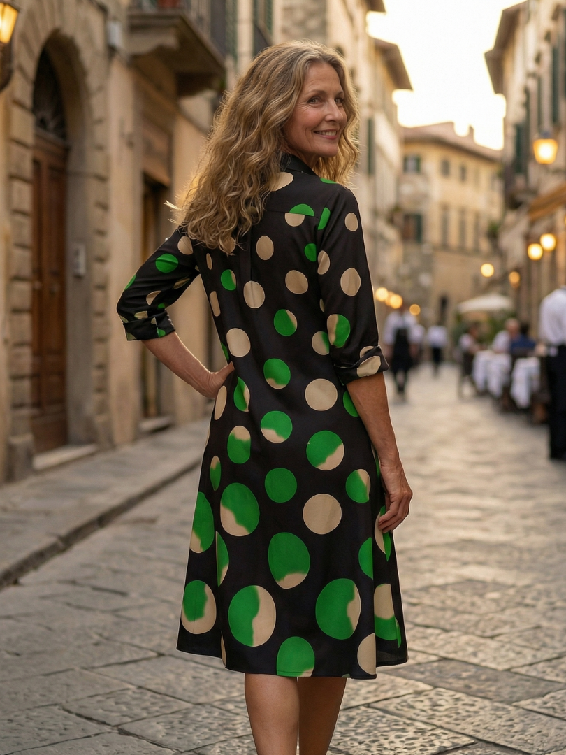 FJØRNA women's summer dress with polka dots, casual flowy style, featuring pockets and short sleeves, perfect for warm weather.
