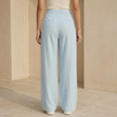 Women's FJØRNA criss-cross waist wide-leg trousers, loose pull-on pants with a relaxed fit and stylish design.