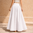 White cotton high-waist maxi skirt by FJØRNA, flowing long skirt with a smooth waistband and full length design for women.