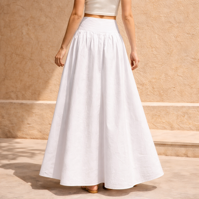 White cotton high-waist maxi skirt by FJØRNA, flowing long skirt with a smooth waistband and full length design for women.