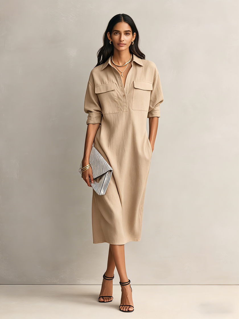 FJØRNA black linen midi dress, elegant evening dress with a flowing silhouette and simple design, suitable for formal occasions.