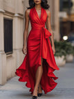 Navy satin halter ruffle gown by FJØRNA featuring elegant ruffles and a sleek satin finish, perfect for formal black tie events.