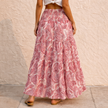 FJØRNA pink paisley shirred high-waist boho maxi skirt with white pattern, flowing and lightweight for women.