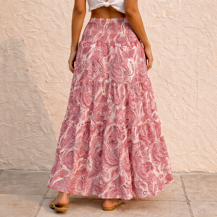 FJØRNA pink paisley shirred high-waist boho maxi skirt with white pattern, flowing and lightweight for women.