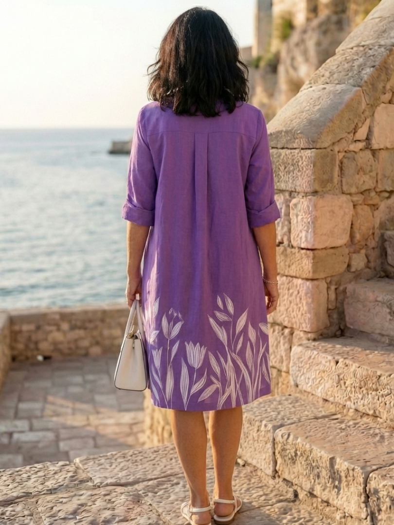 FJØRNA elegant women's floral dress with pockets, featuring a stylish design and comfortable fit for casual or formal occasions.