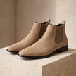FJØRNA black slip-on Chelsea boots for men with sleek leather design and elastic side panels, stylish and versatile footwear.