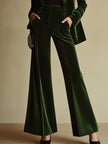 Emerald green velvet two-piece suit set for women, featuring stylish pants and matching top by FJØRNA.