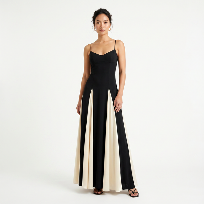 Women's FJØRNA maxi dress with spaghetti straps and contrast color design, flowing and elegant for casual or dressy occasions.
