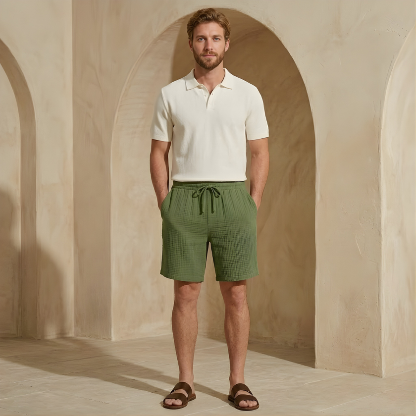 FJØRNA men's textured drawstring relaxed-fit casual summer shorts displayed on a hanger.
