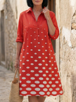 FJØRNA summer dress for women featuring a polka dot pattern and practical pockets, stylish and lightweight for warm weather.