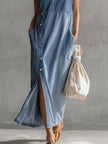 Blue denim V-neck midi dress by FJØRNA, casual style with a relaxed fit, shown on a model.