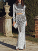 FJØRNA black long sleeve ruched cutout evening gown with elegant design, perfect for formal occasions and evening events.