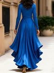 Navy blue FJØRNA satin maxi dress with draped fabric and ruffle details, sleeveless design, and flowing silhouette.