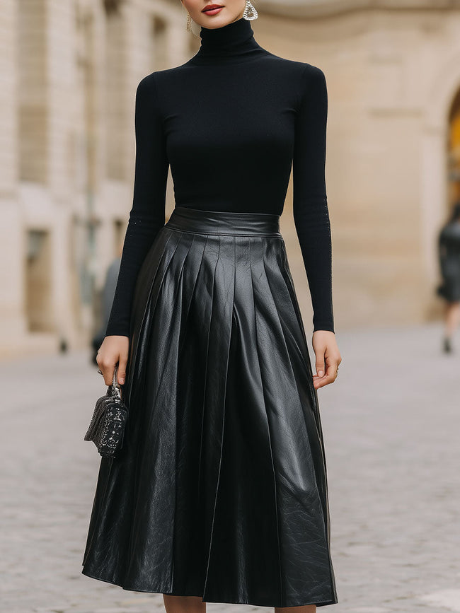 FJØRNA black turtleneck and leather pleated skirt set for women, stylish dress with sleek black leather fabric and fitted design.