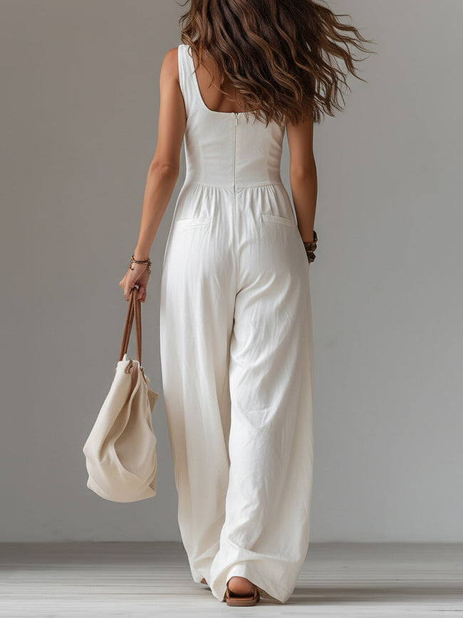 White sleeveless wide-leg jumpsuit with patch pockets for women, stylish and comfortable FJØRNA pants.