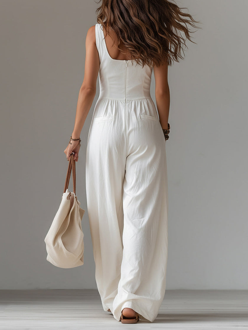 White sleeveless wide-leg jumpsuit with patch pockets for women, stylish and comfortable FJØRNA pants.