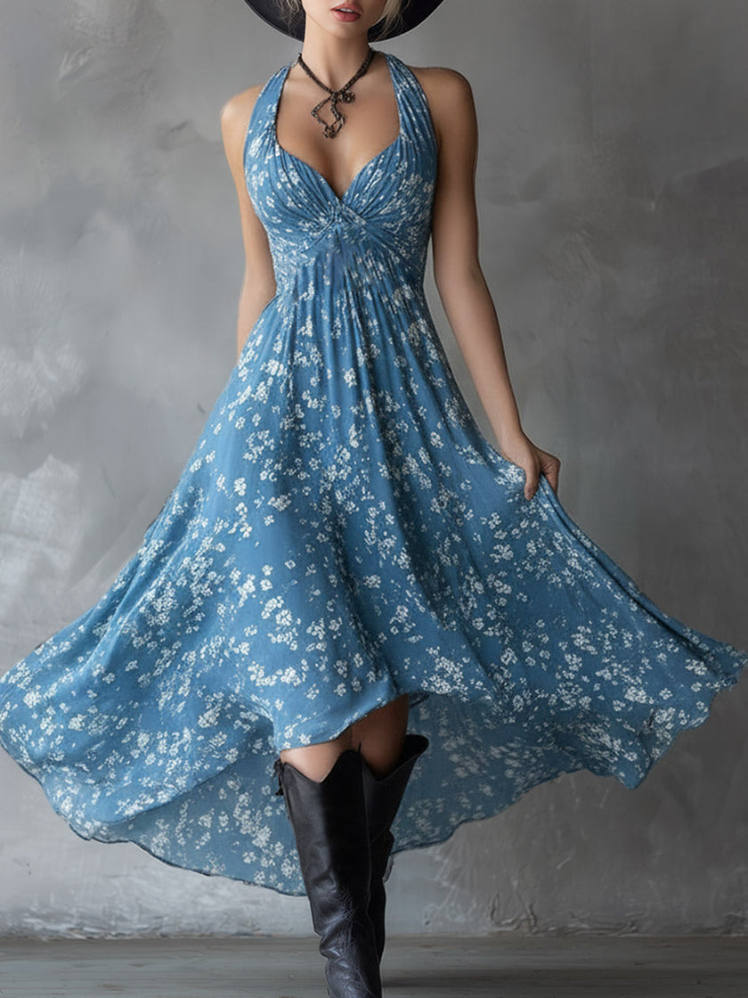 Navy blue chiffon floral maxi dress for women by FJØRNA featuring a flowing silhouette and vibrant flower pattern.